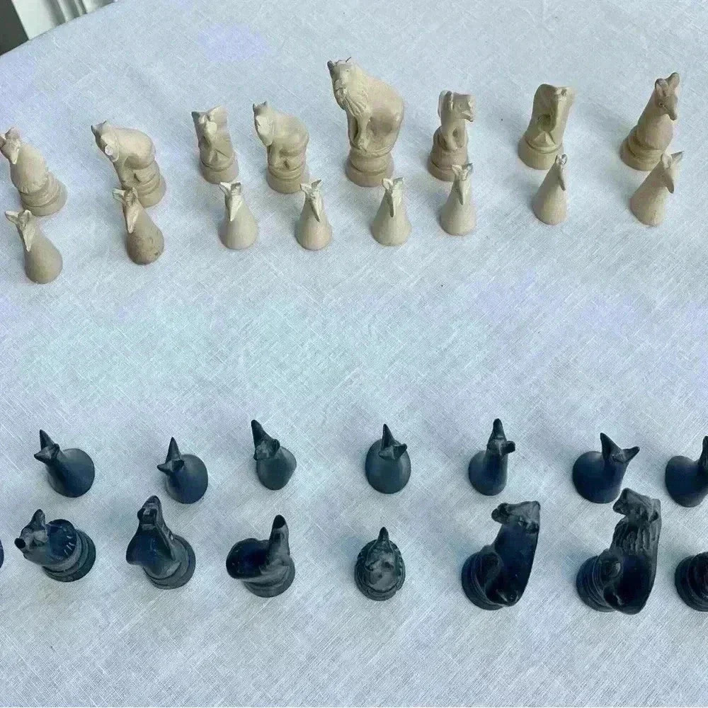 Chess pieces handcarved soapstone made in Africa missing 1 black pawn, 4 damaged
